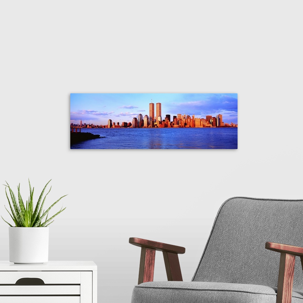 A modern room featuring New York City, skyline with World Trade Center