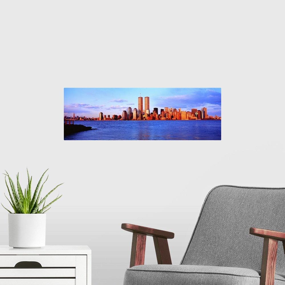 A modern room featuring New York City, skyline with World Trade Center