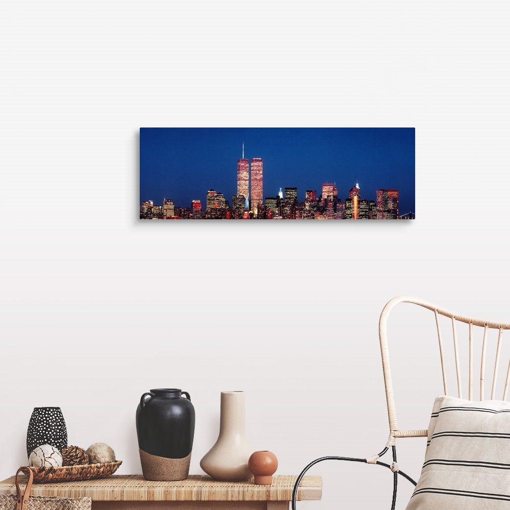 A farmhouse room featuring Giant panoramic photograph of New York City skyscrapers at night, including the World Trade Center.