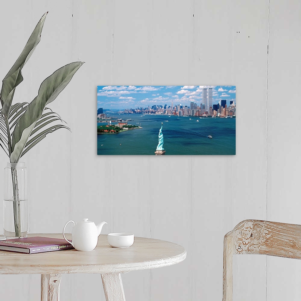A farmhouse room featuring Panoramic wall art of Manhattan, Ellis Isle, and Hudson River photographed from south of the Stat...