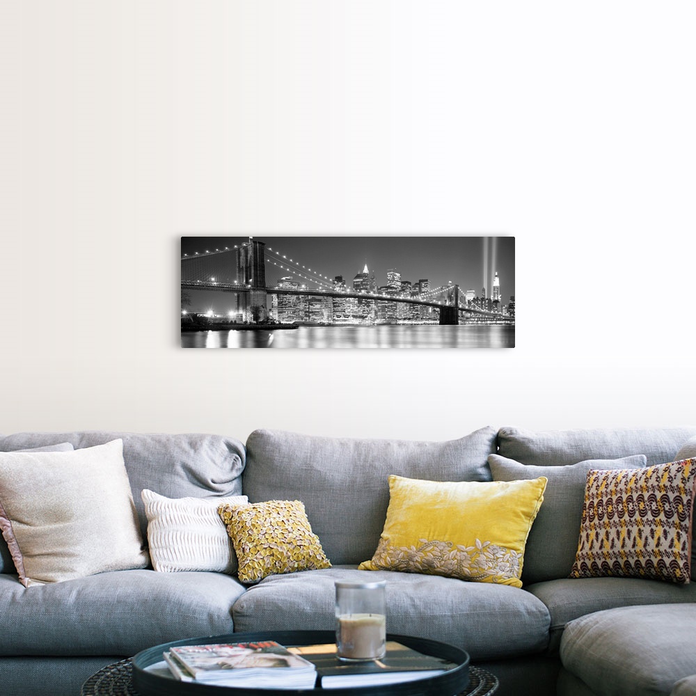A farmhouse room featuring A panoramic landscape photo taken after 2001 of Manhattan and Brooklyn Bridge shining bright over...