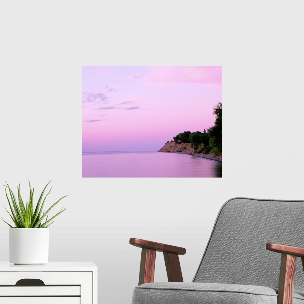 A modern room featuring New York, Sodus Bay, Chimney Bluffs State Park, Lake Ontario, Sunset over a lake