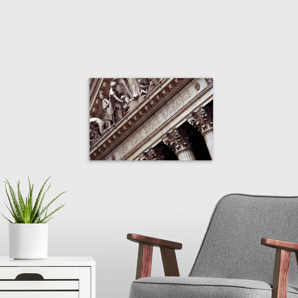 A modern room featuring This wall art is a photograph of the architectural detail of this financial institution showing a...