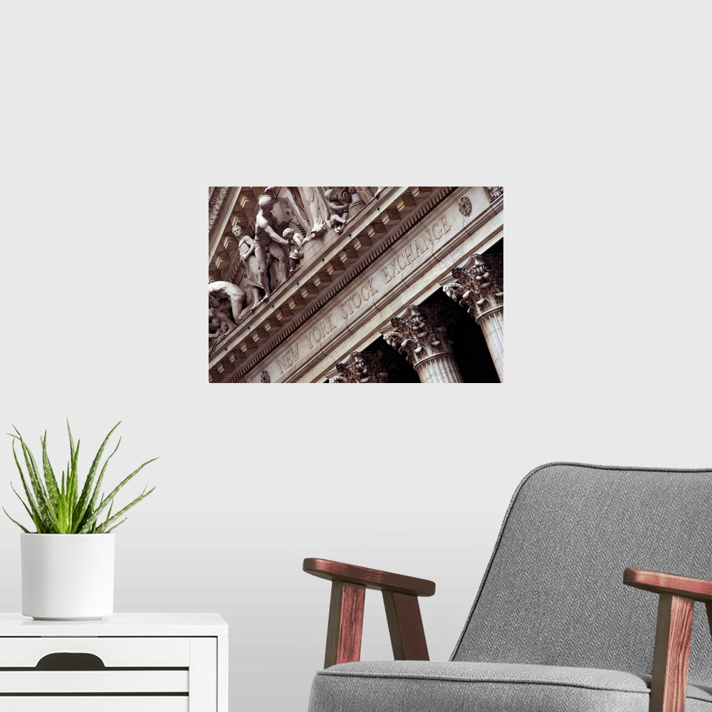 A modern room featuring This wall art is a photograph of the architectural detail of this financial institution showing a...