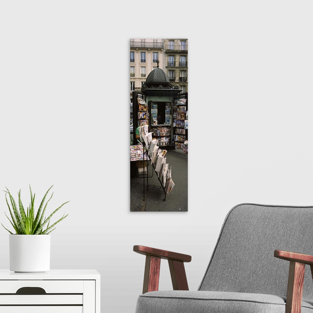 A modern room featuring Newsstand on a street, Paris, France