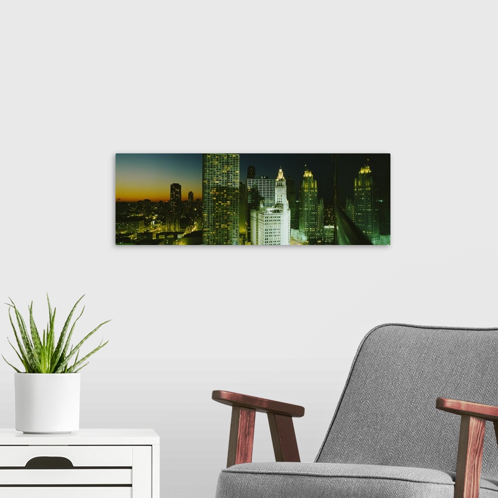 A modern room featuring Panoramic photo on canvas of the Chicago cityscape at sunset.