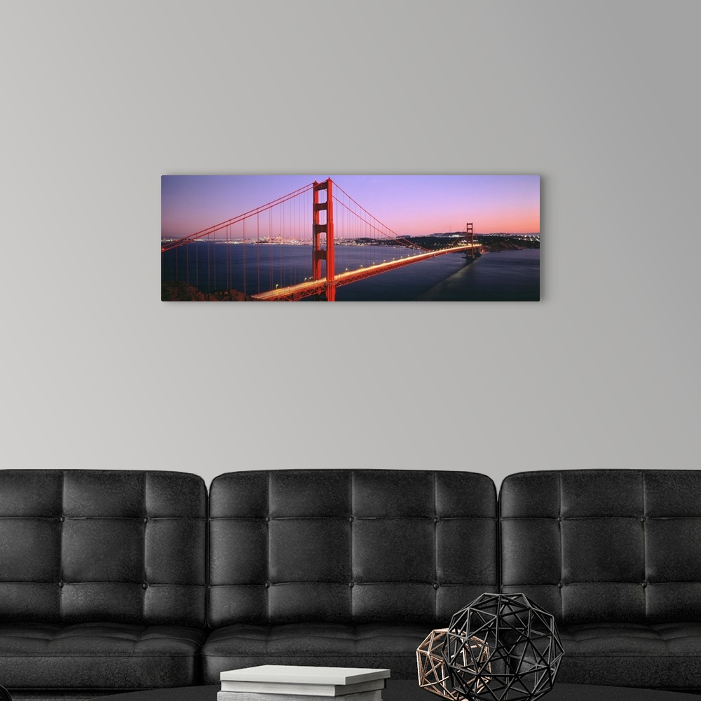 A modern room featuring Panoramic photograph includes a landmark bridge spanning a large body of water in California.  Th...