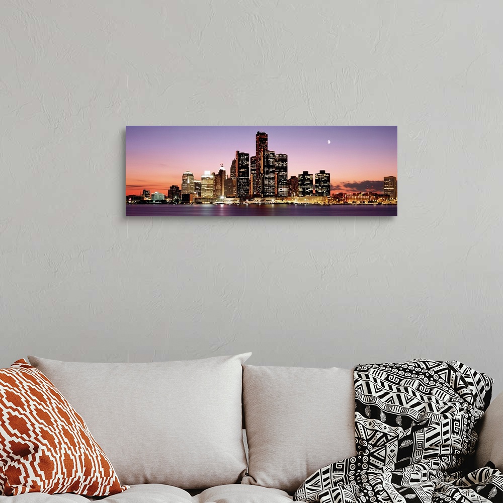 A bohemian room featuring Panoramic skyline of downtown Detroit at sundown.