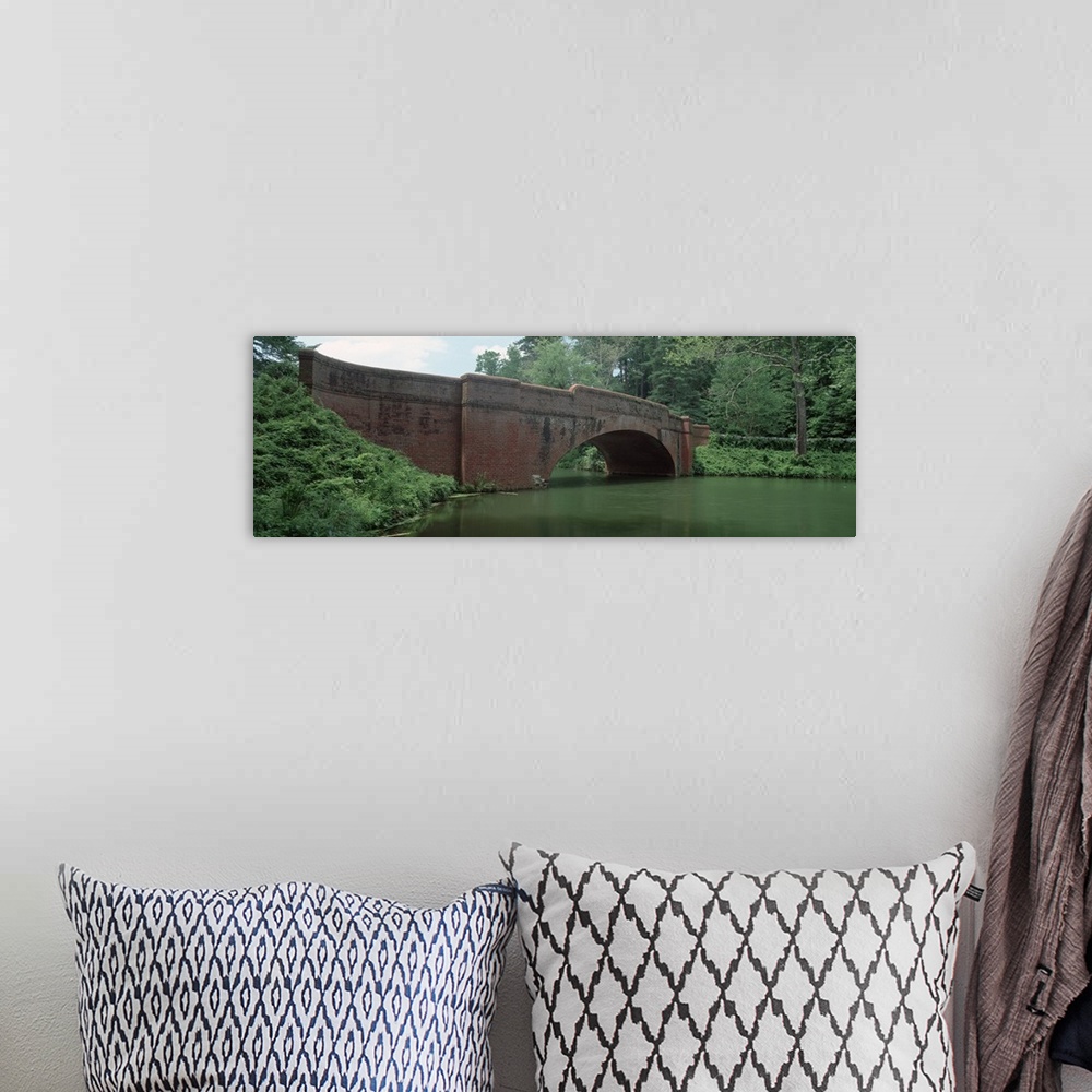 A bohemian room featuring North Carolina, Asheville, View of a red brick arched bridge over river