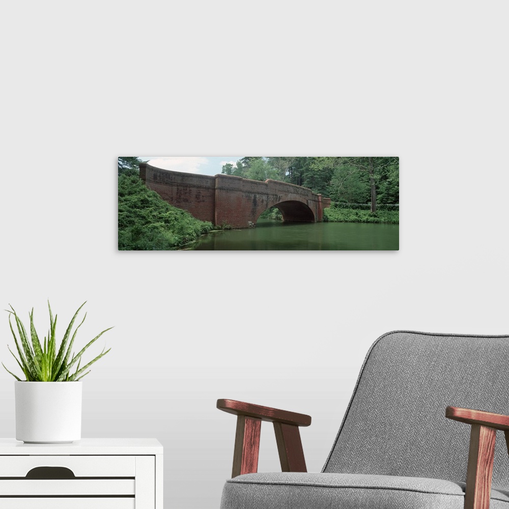 A modern room featuring North Carolina, Asheville, View of a red brick arched bridge over river