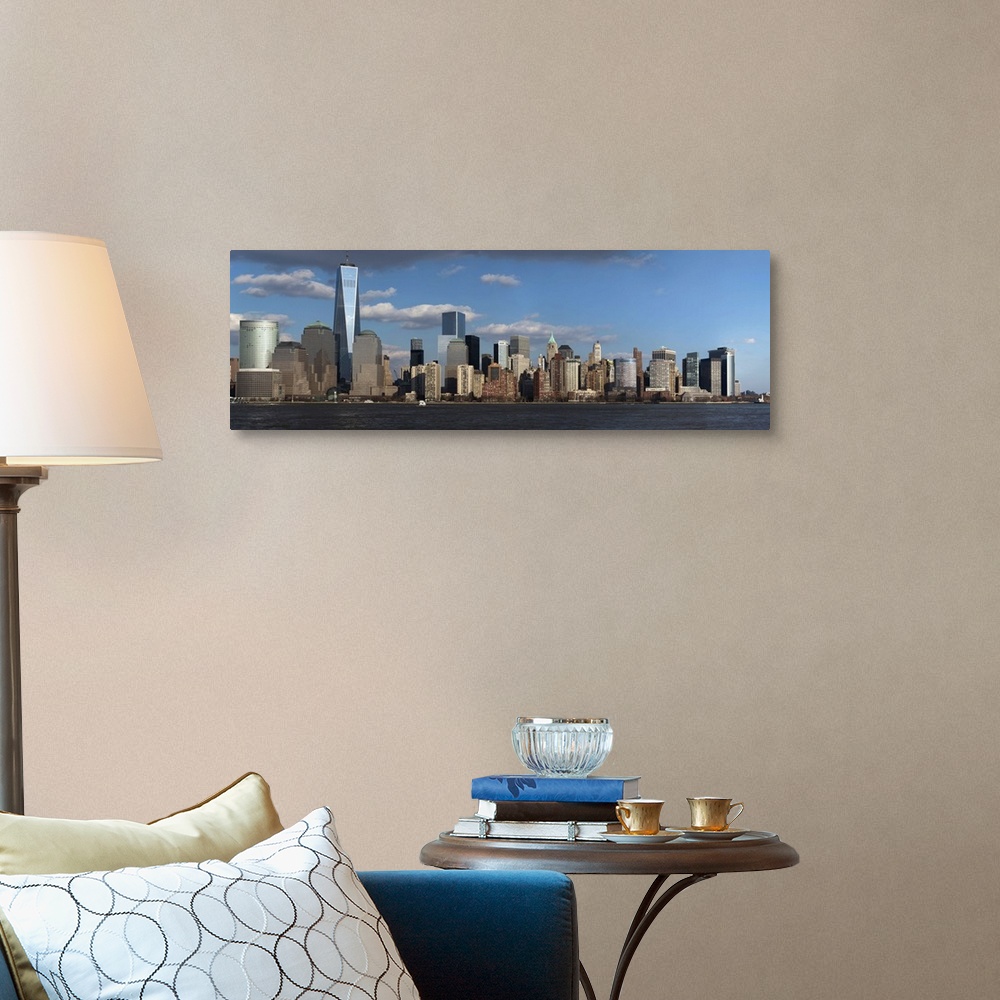 A traditional room featuring Panoramic view of New York City Skyline on water featuring One World Trade Center (1WTC), Freedom...