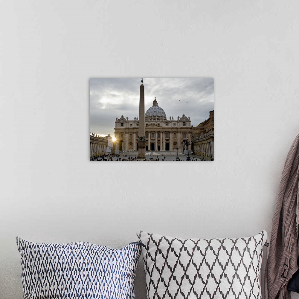 A bohemian room featuring Obelisk in front of the St. Peter's Basilica at sunset, St. Peter's Square, Vatican City