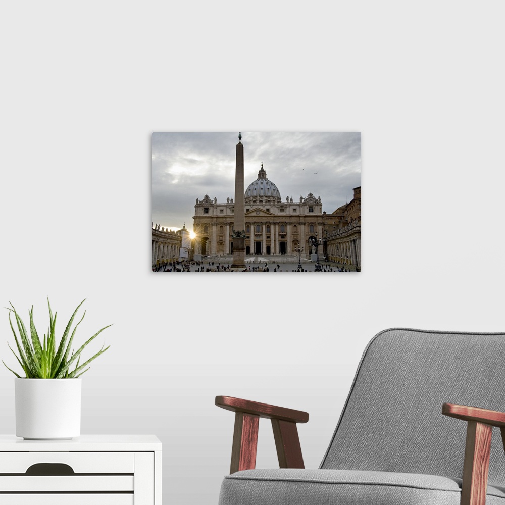 A modern room featuring Obelisk in front of the St. Peter's Basilica at sunset, St. Peter's Square, Vatican City