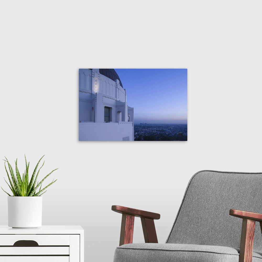A modern room featuring USA, California, Los Angeles, Griffith Park Observatory and downtown, dusk