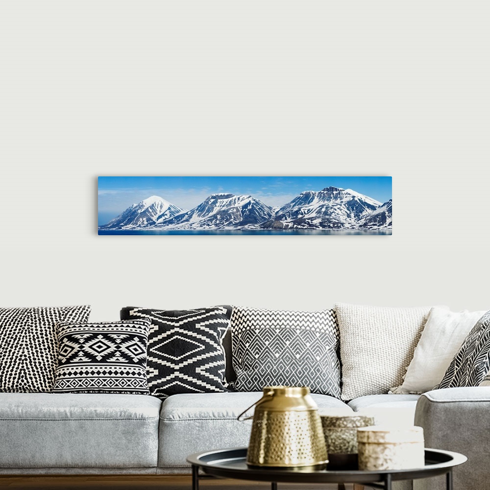 A bohemian room featuring Ocean with a mountain range in the background, Bellsund, Spitsbergen, Svalbard Islands, Norway
