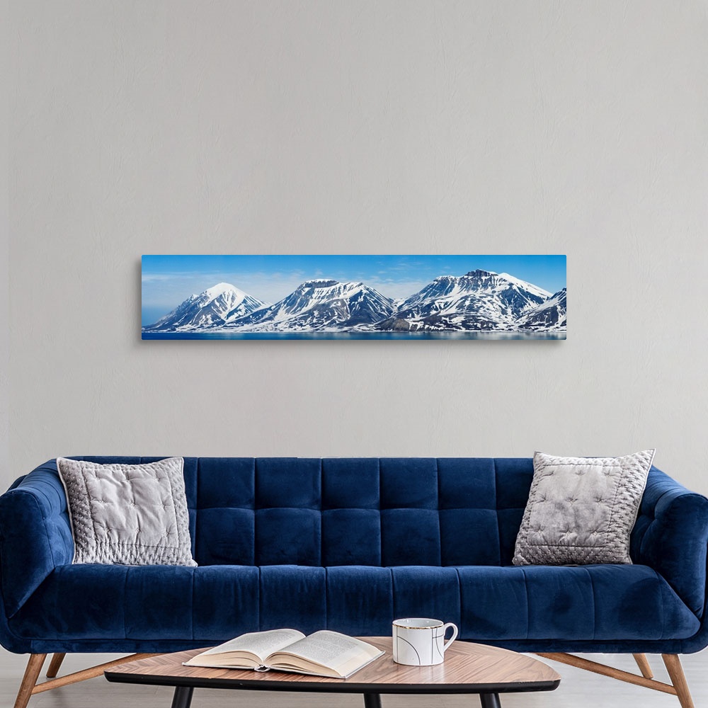 A modern room featuring Ocean with a mountain range in the background, Bellsund, Spitsbergen, Svalbard Islands, Norway
