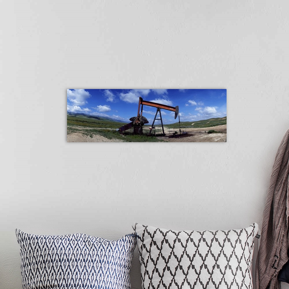 A bohemian room featuring Oil drill on a landscape, Taft, Kern County, California