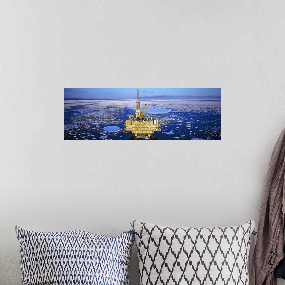 A bohemian room featuring Oil production platform in icy water, Cook Inlet, Trading Bay, Alaska