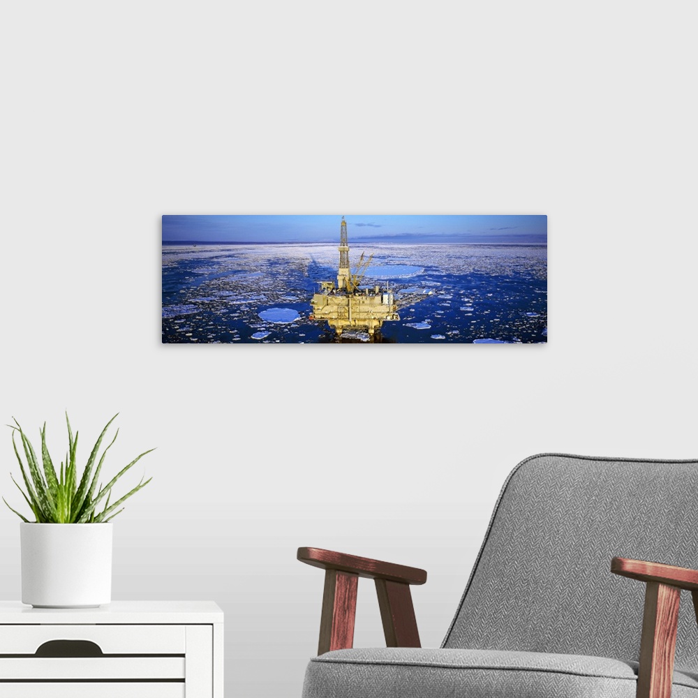 A modern room featuring Oil production platform in icy water, Cook Inlet, Trading Bay, Alaska