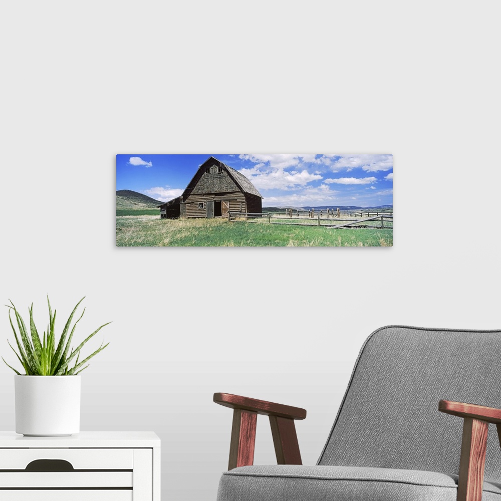 A modern room featuring Old barn in a field, Colorado
