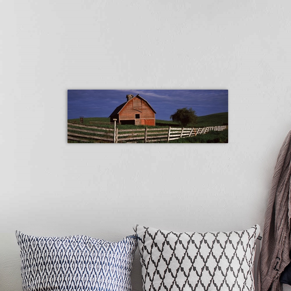 A bohemian room featuring Old barn with a fence in a field, Palouse, Whitman County, Washington State,