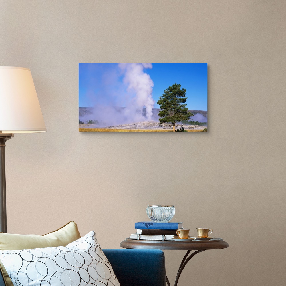 A traditional room featuring Old Faithful Geyser Erupting