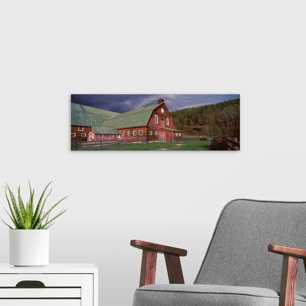 A modern room featuring Old red barn with green rooftops in a farm, Vermont,