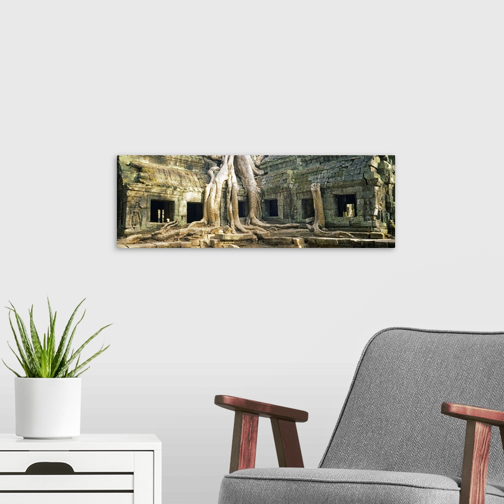 A modern room featuring Old ruins of a building, Angkor Wat, Cambodia
