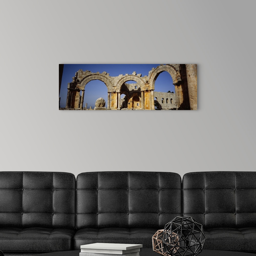 A modern room featuring Old ruins of a church, St. Simeon Church, Aleppo, Syria