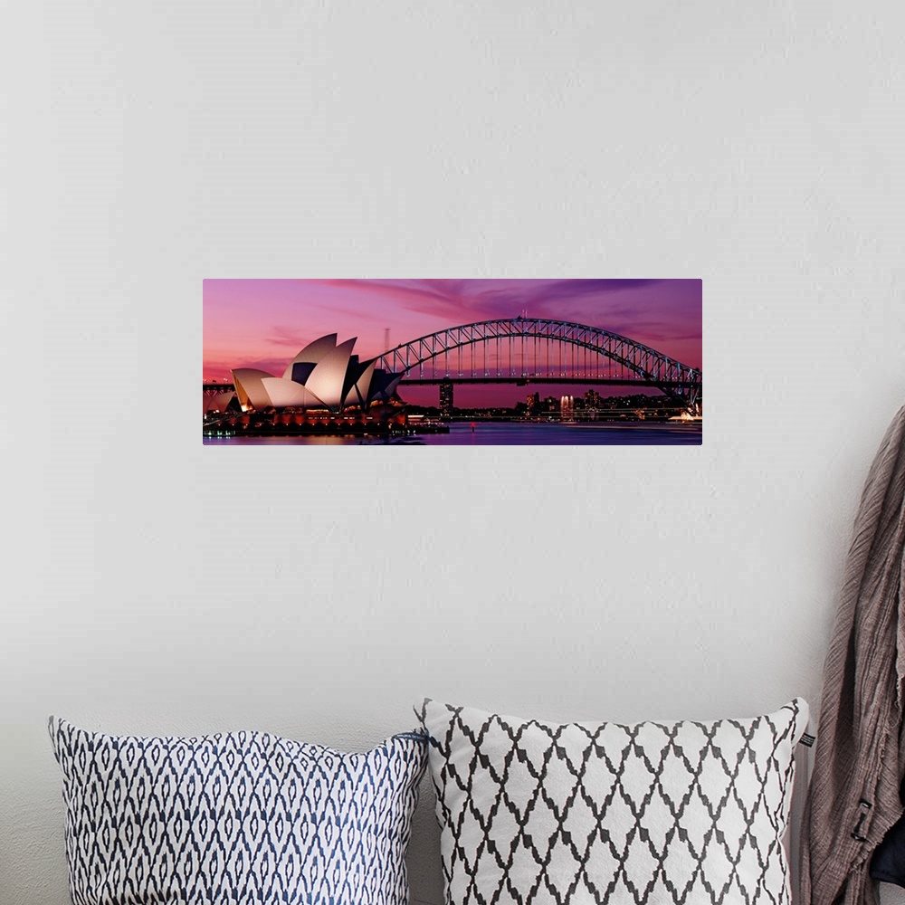 A bohemian room featuring Panoramic photograph of iconic floating building structure with bridge and city skyline in distan...