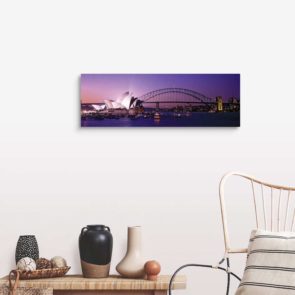 A farmhouse room featuring Panoramic photograph of floating music house with city skyline and bridge in the distance at sunset.