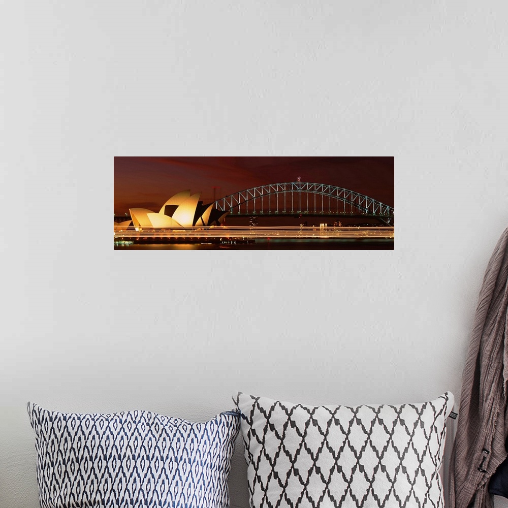 A bohemian room featuring Opera house lit up at night with light streaks, Sydney Harbor Bridge, Sydney Opera House, Sydney,...
