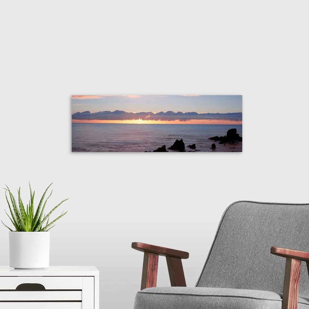 A modern room featuring Oregon, Pacific Ocean, sunset