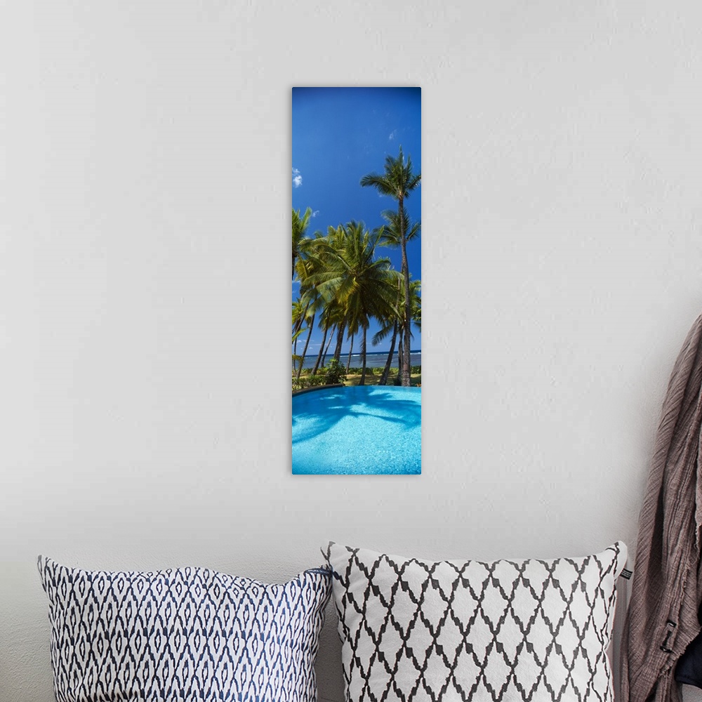 A bohemian room featuring Palm trees near a swimming pool Maui Hawaii
