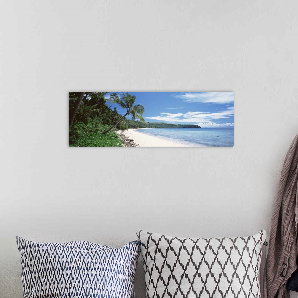 A bohemian room featuring Palm trees on the beach, Nananu-i Ra Island, Fiji