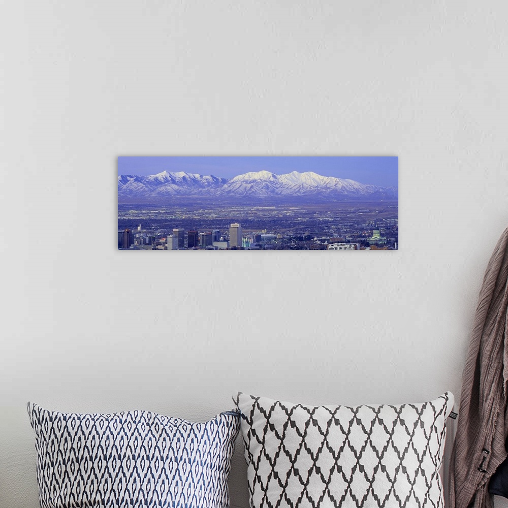 A bohemian room featuring Panoramic sunset of Salt Lake City with snow capped Wasatch Mountains