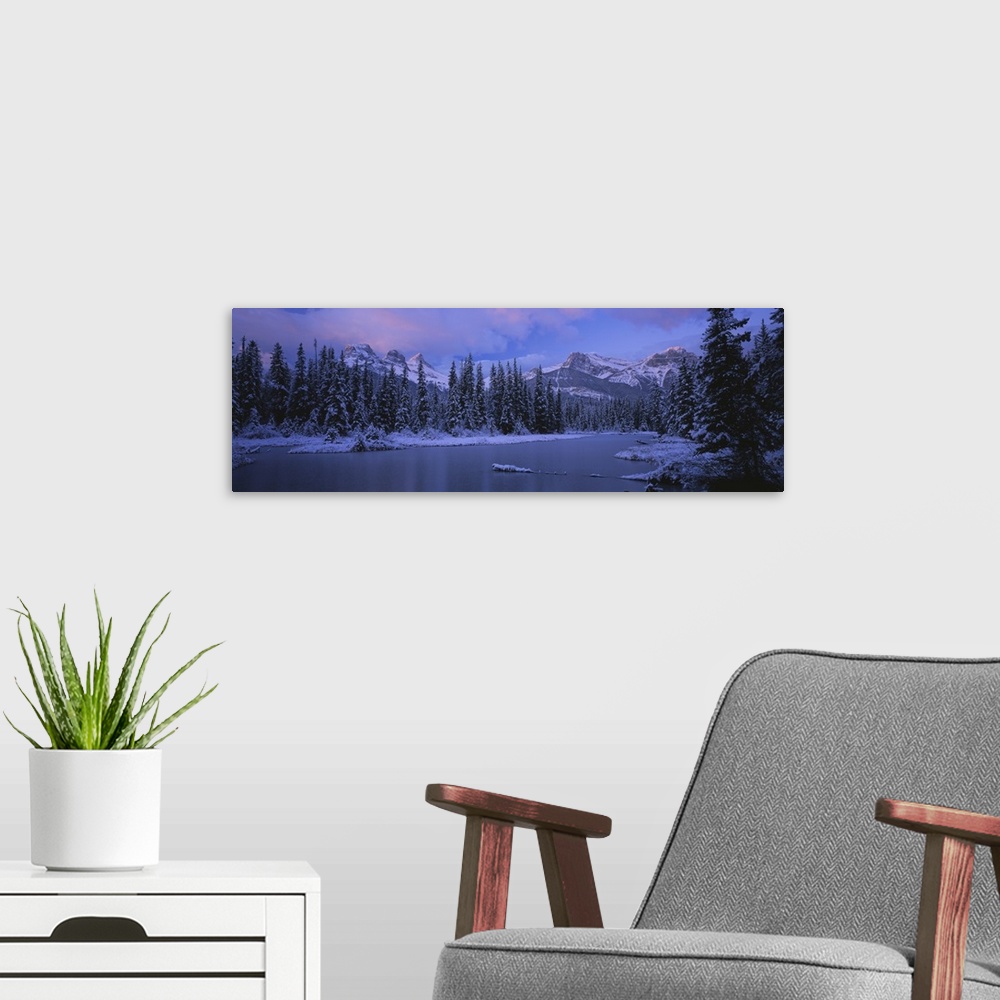 A modern room featuring Panoramic view of snowcapped trees and mountains, Bow Valley, Alberta, Canada