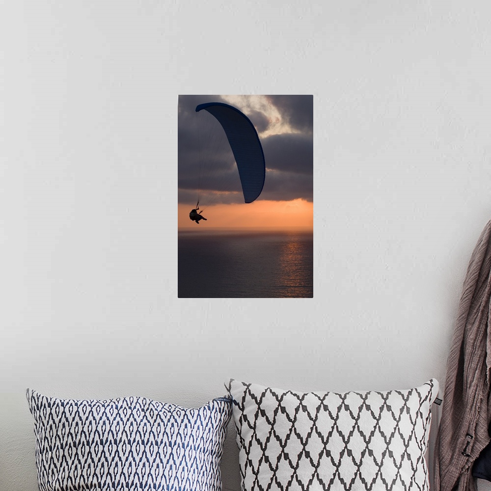 A bohemian room featuring Paraglider flying in the sky over an ocean, Pacific Ocean, San Diego, California