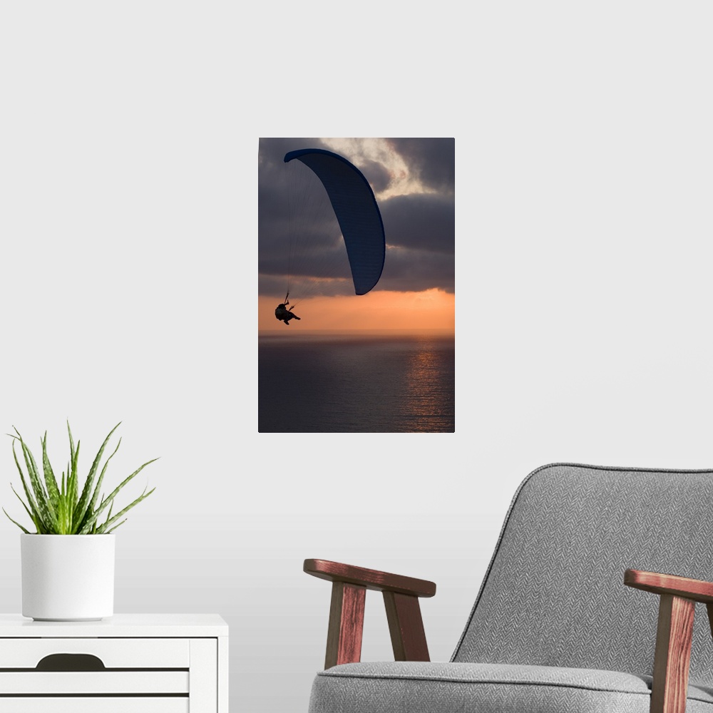 A modern room featuring Paraglider flying in the sky over an ocean, Pacific Ocean, San Diego, California