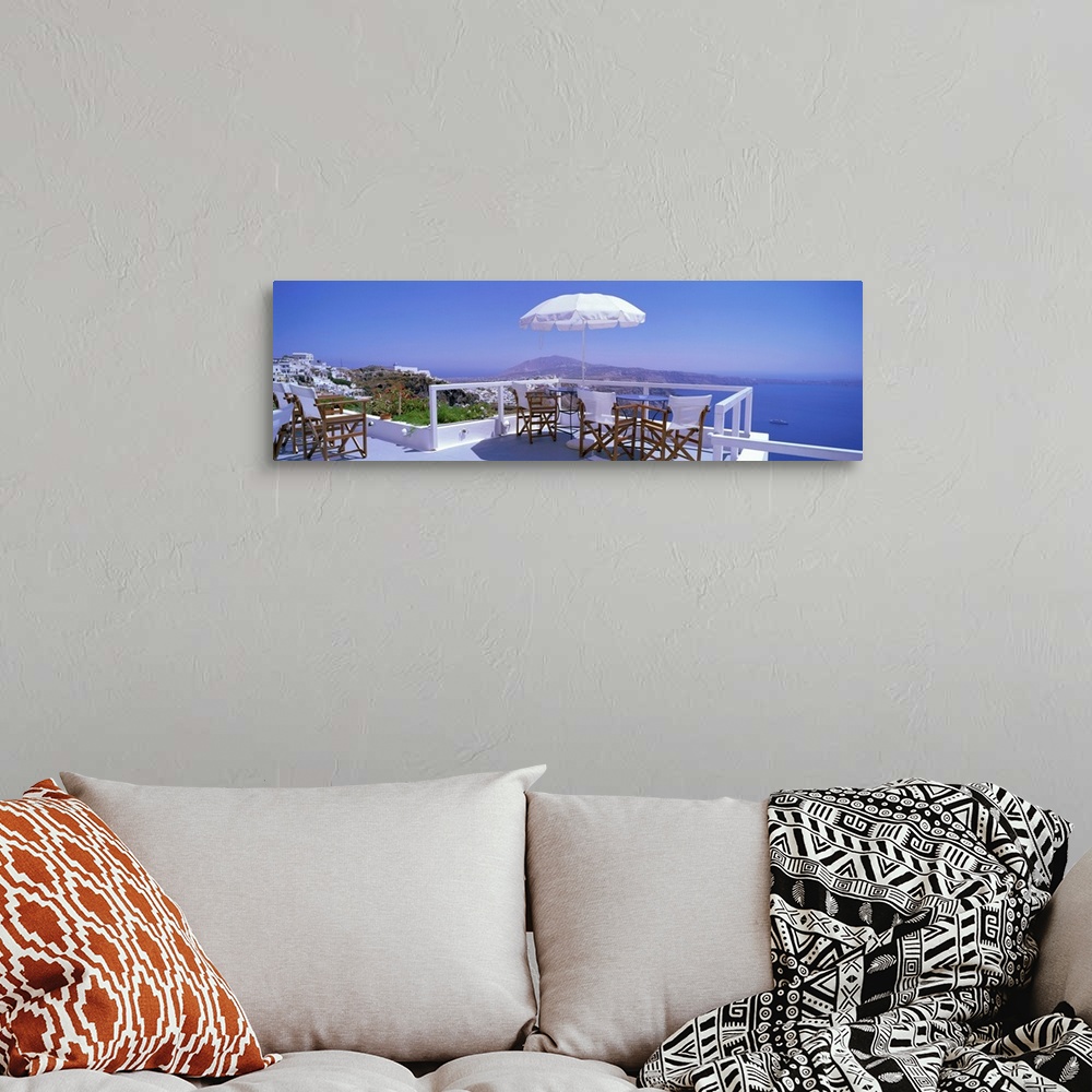 A bohemian room featuring Patio Overlooking Aegean Sea Santorini Greece