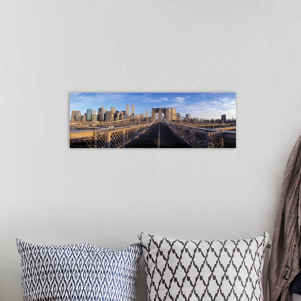 A bohemian room featuring Panoramic view from the Brooklyn Bridge of walk into Manhattan with skyscrapers in the background.