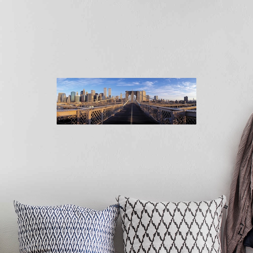 A bohemian room featuring Panoramic view from the Brooklyn Bridge of walk into Manhattan with skyscrapers in the background.