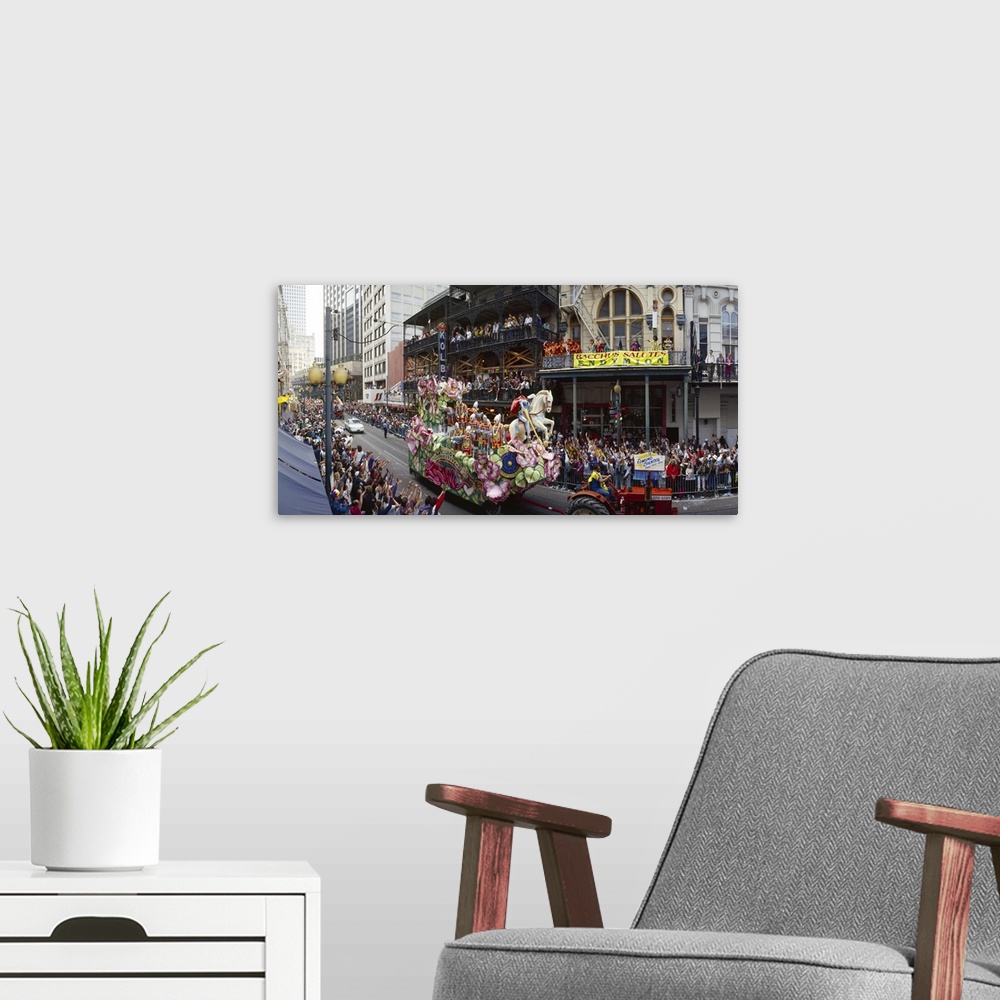 A modern room featuring Large horizontal photograph of a tractor pulling a float through the crowded city streets of New ...