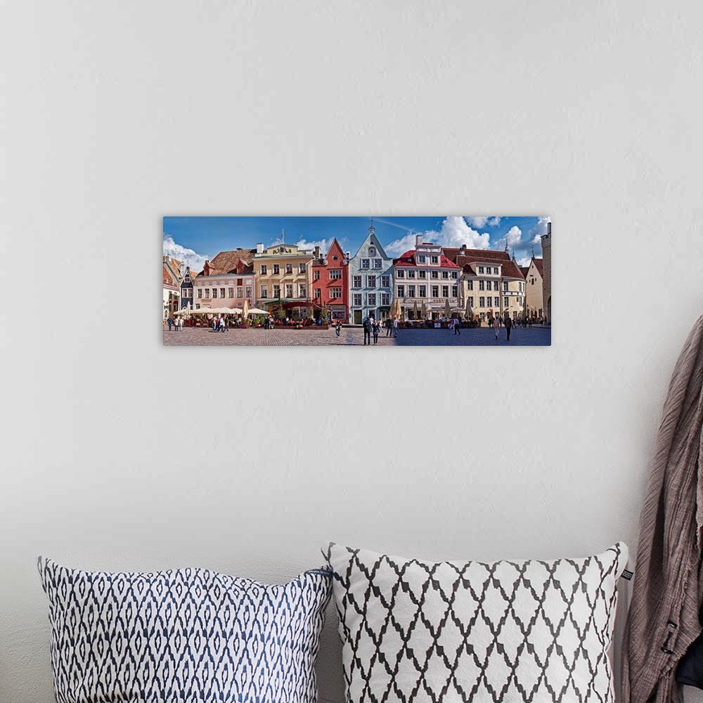 A bohemian room featuring People with buildings in the city, Tallinn, Estonia