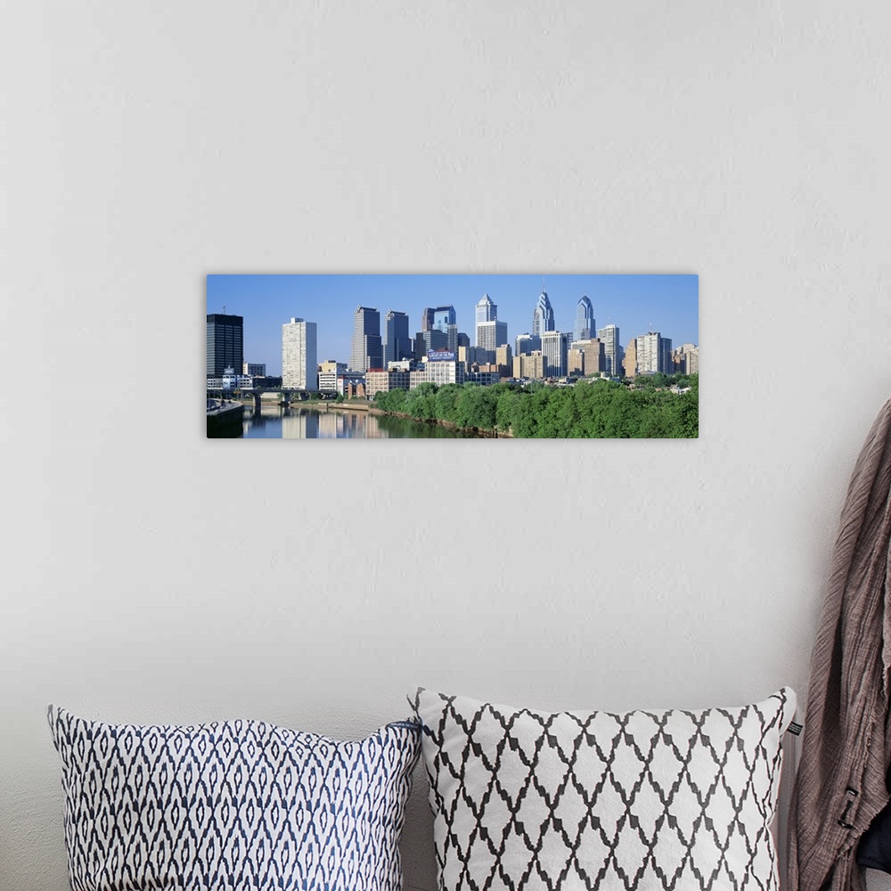 A bohemian room featuring Panoramic photograph taken of downtown Philadelphia on a sunny day.