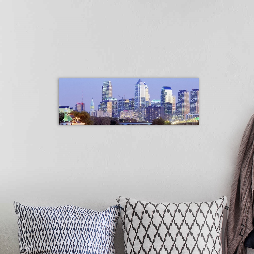 A bohemian room featuring Downtown  skyline taken at night with boathouse row lights lit up.