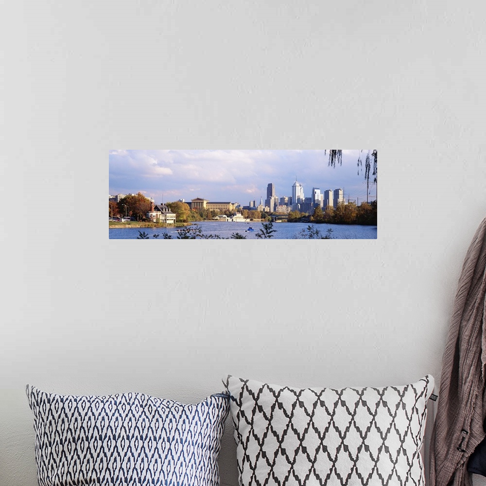A bohemian room featuring This panoramic photograph includes a view of the city skyline, the art museum, and the Schuylkill...