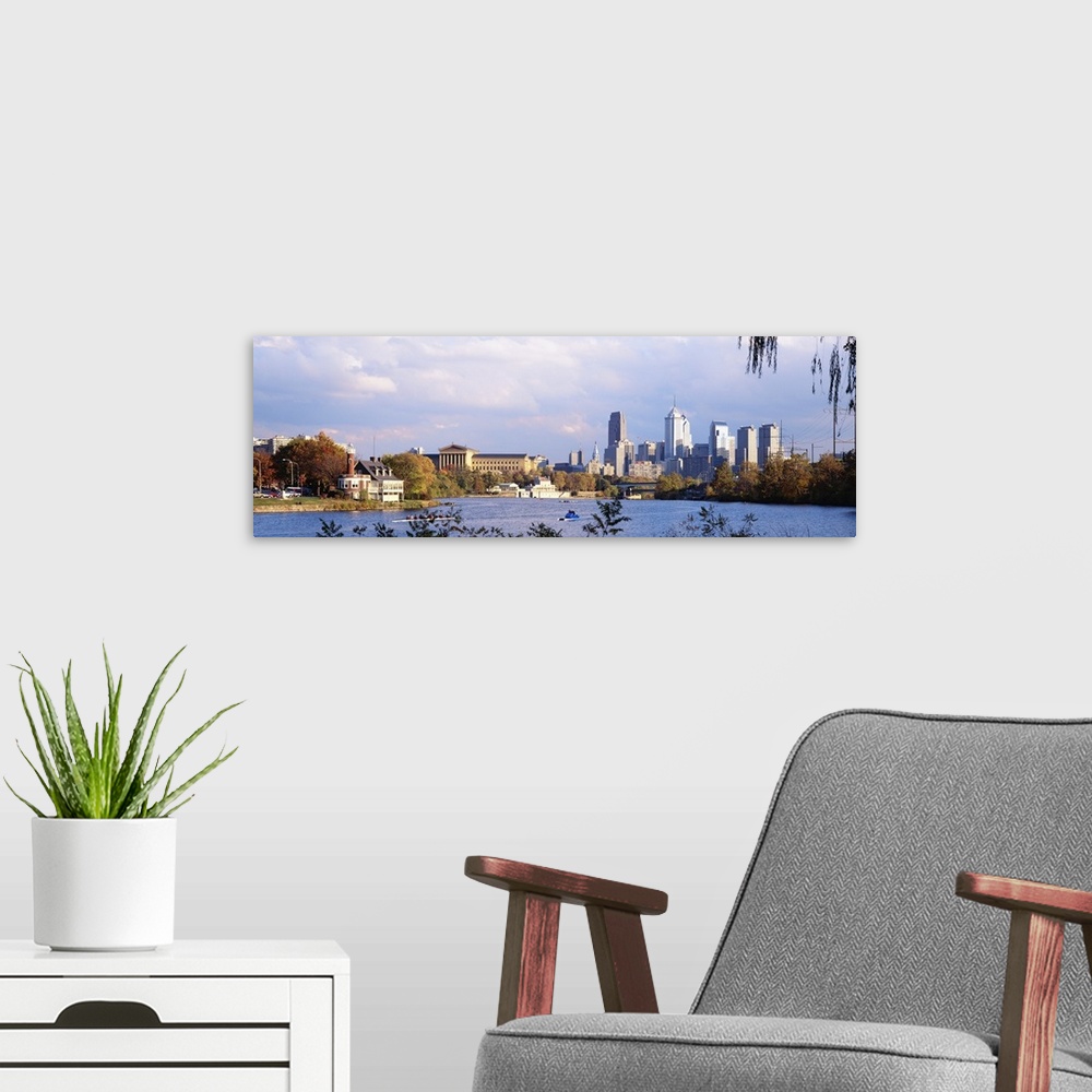 A modern room featuring This panoramic photograph includes a view of the city skyline, the art museum, and the Schuylkill...