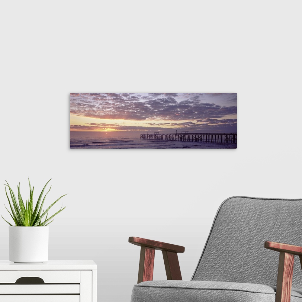 A modern room featuring Pier at sunrise, Amelia Island, Nassau County, Florida, USA