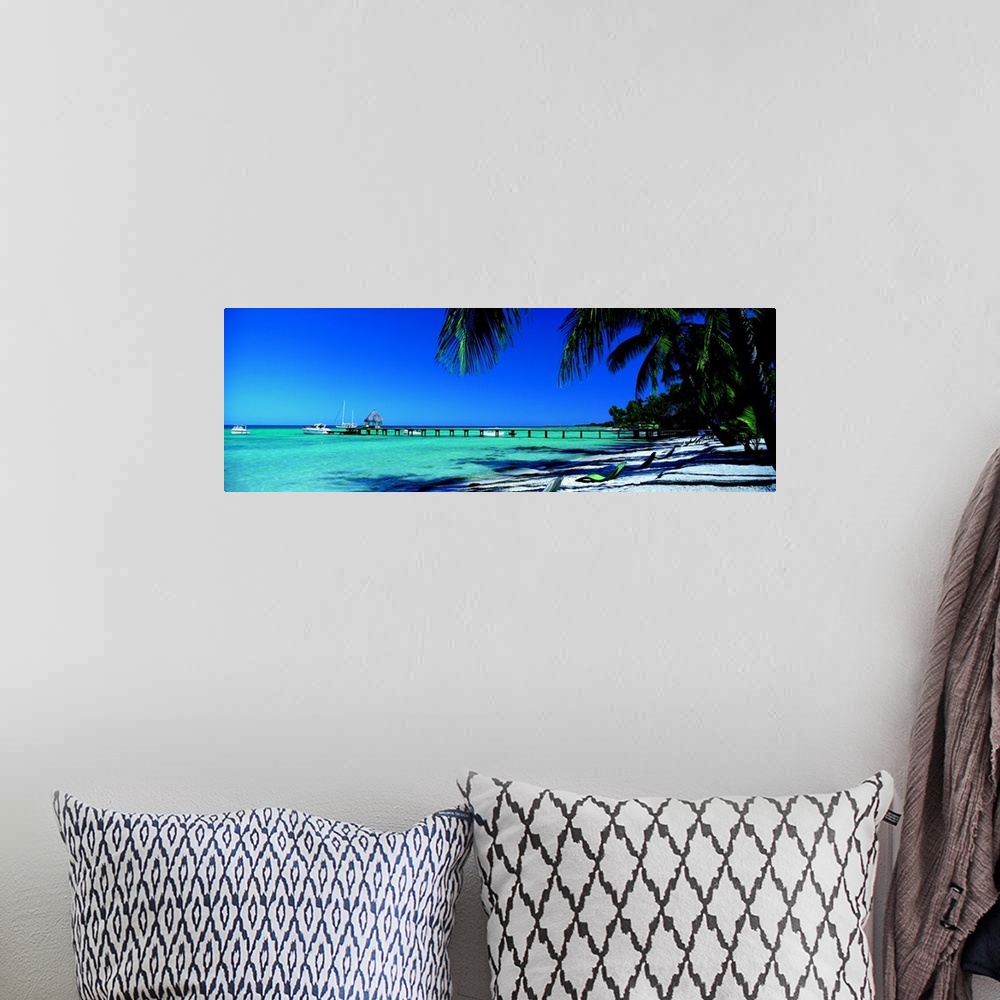 A bohemian room featuring Pier Beach Langiloa French Polynesia